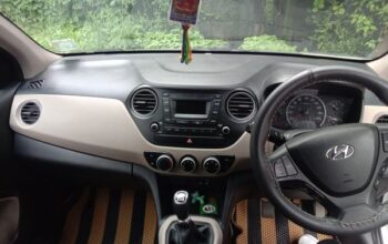 2017 model Grand i10 Sportz car for sale, with 20,000 km driven, all documents clear, single-hand used.