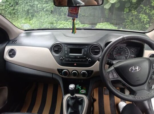 2017 model Grand i10 Sportz car for sale, with 20,000 km driven, all documents clear, single-hand used.