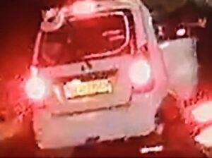 Lost white Wagon R vehicle with back mirror on top and writing on the back glass, last seen traveling from Swastic to Manipal Hospital.