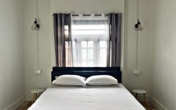 A 4BHK apartment with 3 western toilets, a bathtub, a balcony, and a backyard fire pit is available on Sichey Link Road.