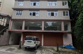 A roadside commercial space with an attached washroom is available at 6th-mile roadside next to Hotel Royal Potala, suitable for a bank, hardware retail shop, showroom, or fitness center.