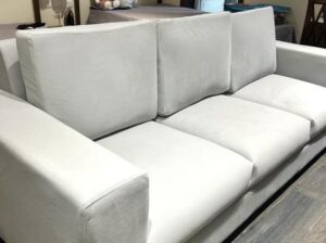 Brand new 3 seater grey sofa for sale with no defects.