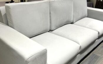 Brand new 3 seater grey sofa for sale with no defects.