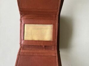 A brown wallet belonging to Biswas Rai, resident of Mangarjung Tea Garden, has been found, containing an Axis ATM card, DL, and Aadhar card.