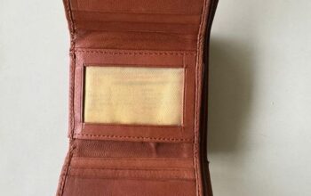 A brown wallet belonging to Biswas Rai, resident of Mangarjung Tea Garden, has been found, containing an Axis ATM card, DL, and Aadhar card.