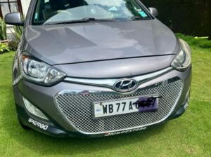 A 2013 Hyundai I-20 Magna in good condition is for sale for Rs 2,50,000, with tax valid until 2028, first-class insurance until May, and only 48,500 km driven, located in Gangtok.