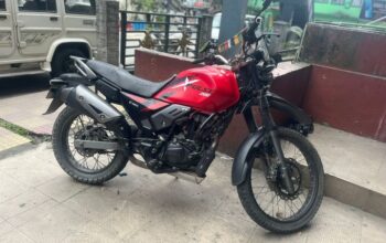 A Hero XPulse 200, priced at Rs. 90,000, with all documents up to date and lifetime 1st party insurance, is for urgent sale.