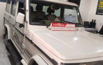 2022 Mahindra Bolero BS6 Optional with low mileage, 5 years of token tax, first-party insurance, and accessories like a back camera and flooring is for sale.