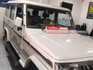 2022 Mahindra Bolero BS6 Optional with low mileage, 5 years of token tax, first-party insurance, and accessories like back camera and flooring is for sale.