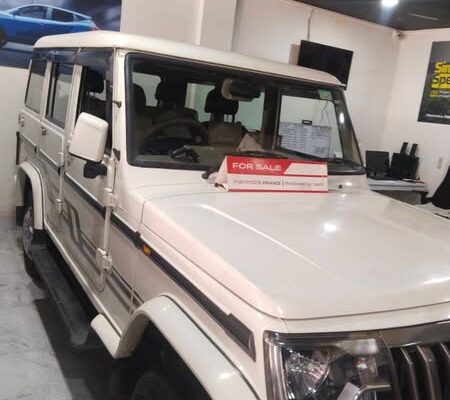 2022 Mahindra Bolero BS6 Optional with low mileage, 5 years of token tax, first-party insurance, and accessories like back camera and flooring is for sale.